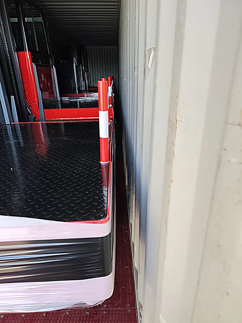 Opening the container with forklifts inside